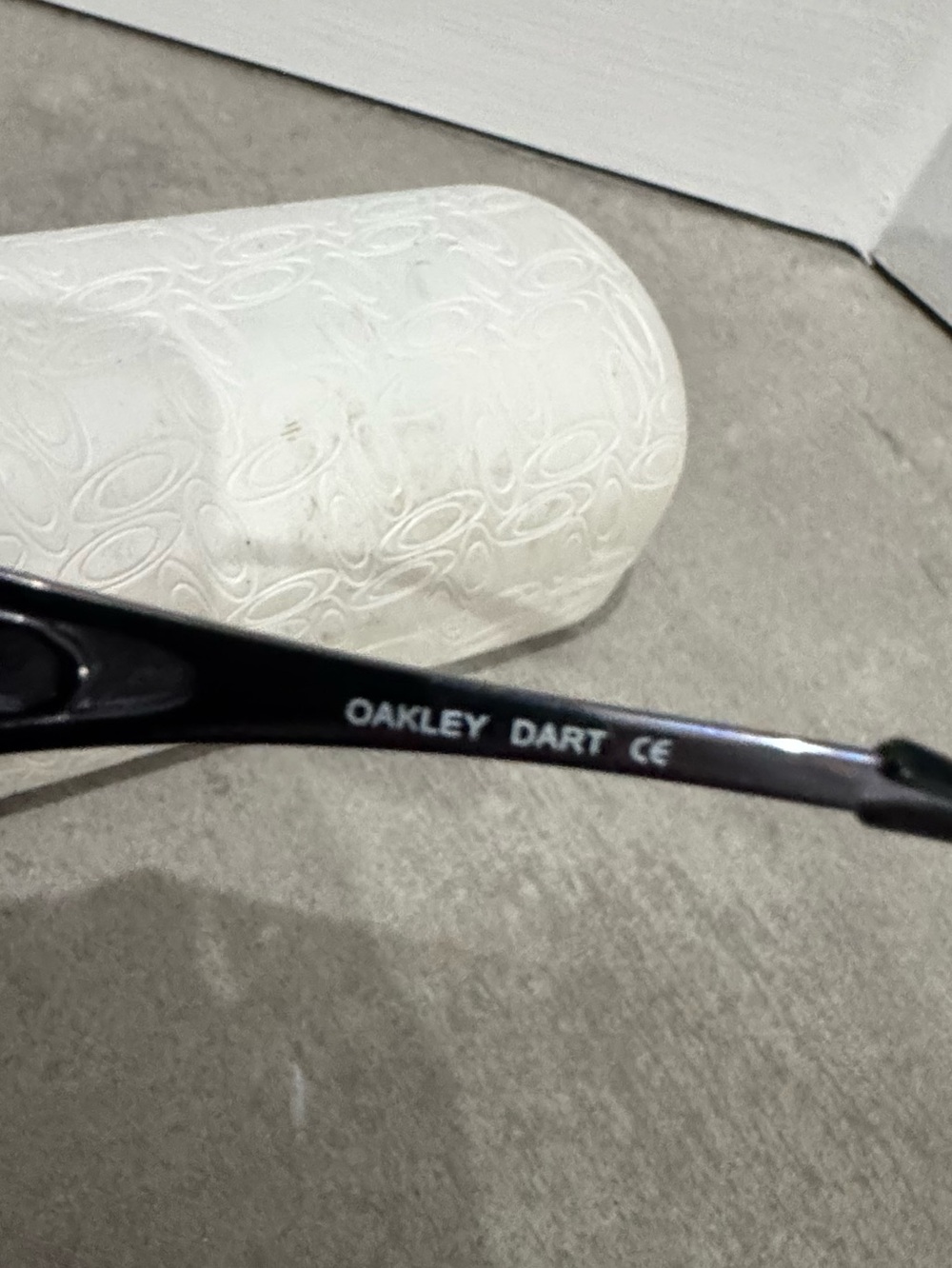 Oakley Dart OO4008 sunglasses featuring a polished black frame with grey lenses - Picture 8 of 15